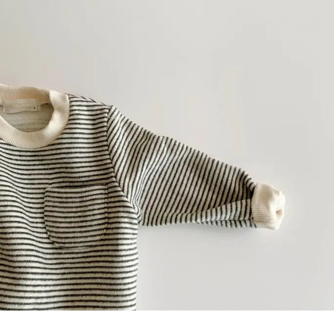 Wear striped baby jumpsuits outside