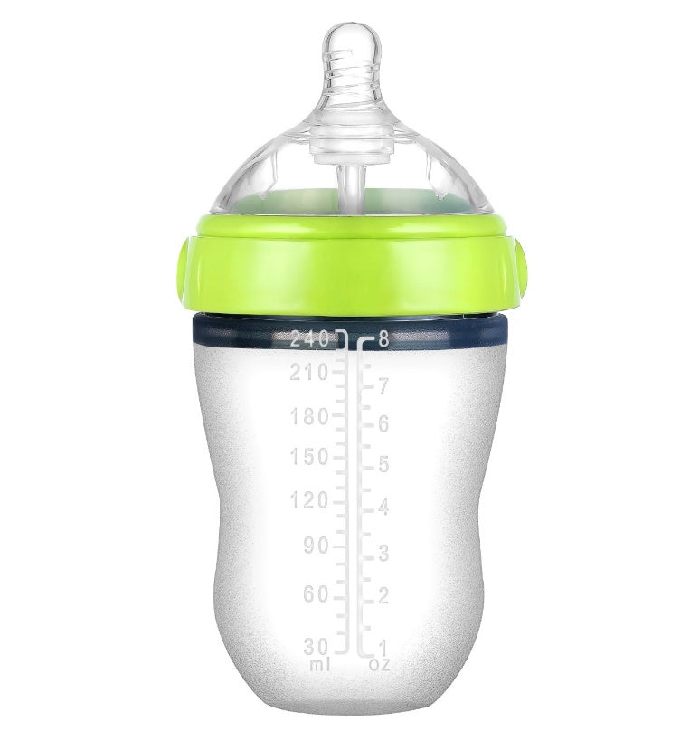 Baby’s bottle with spoon