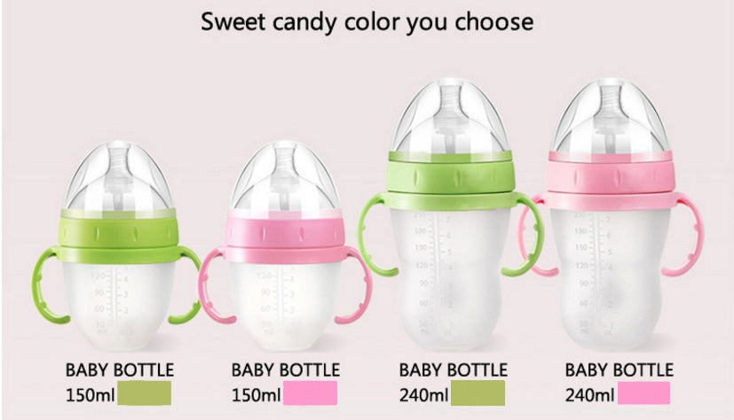 Baby’s bottle with spoon