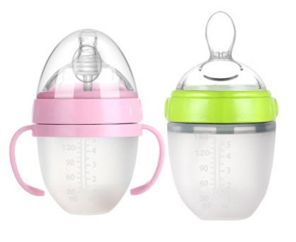 Baby’s bottle with spoon