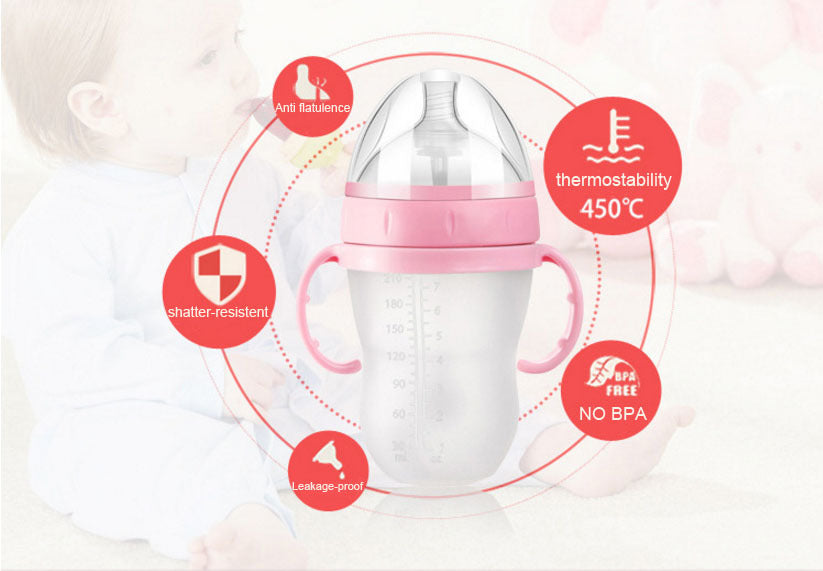 Baby’s bottle with spoon