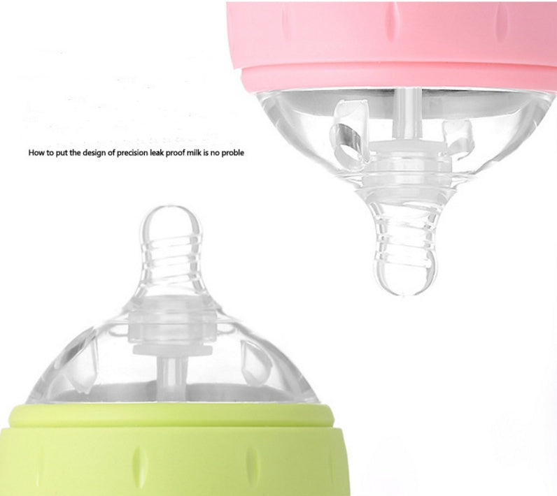 Baby’s bottle with spoon