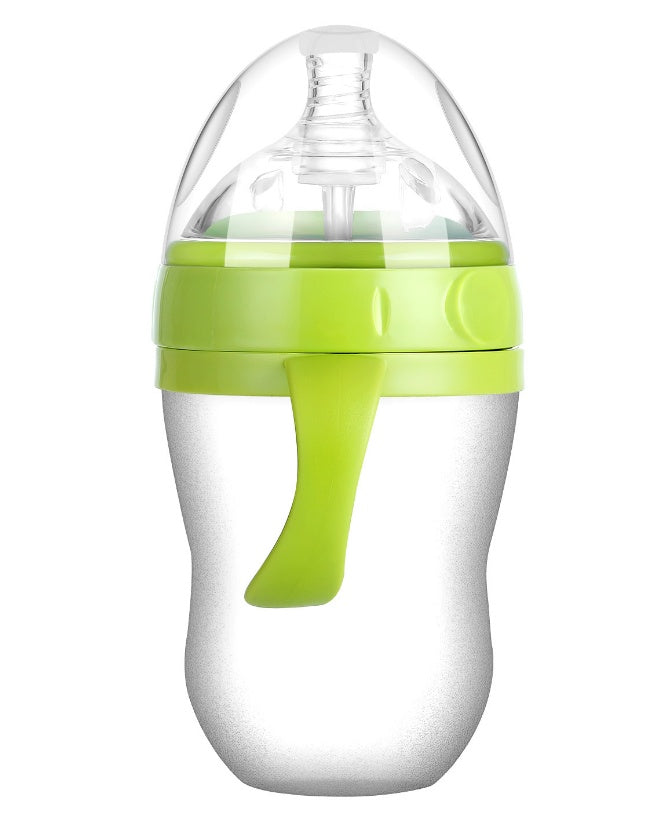 Baby’s bottle with spoon