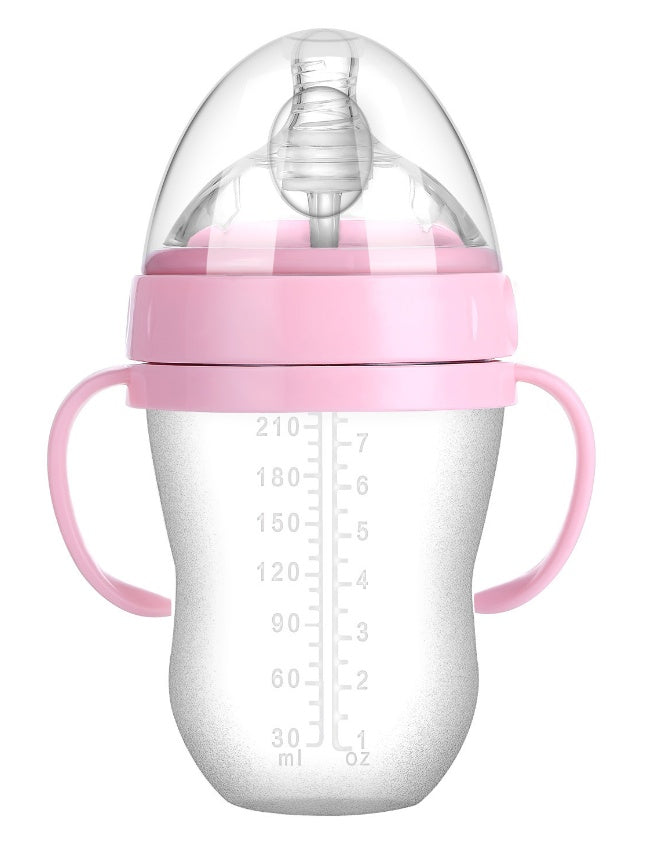 Baby’s bottle with spoon