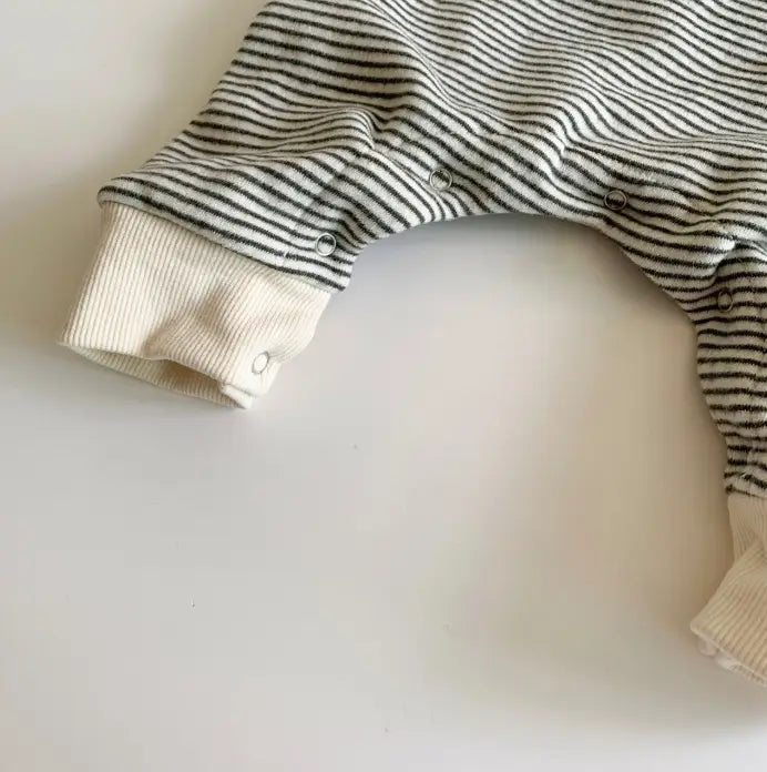 Wear striped baby jumpsuits outside