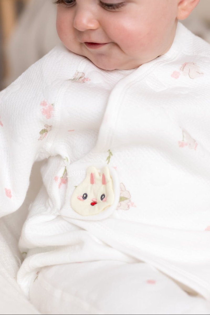 The Snuggle Bun Boucle Wrap Baby Grow Romper - Rompers